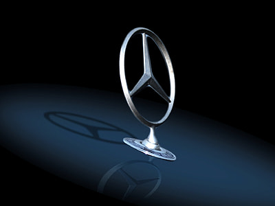 Mercedes-Benz emblem isolated on black background thumbnail