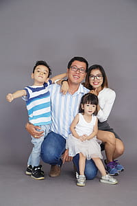 Man Wearing White and Gray Striped Polo Shirt thumbnail