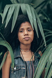 Woman Standing Near Plants thumbnail