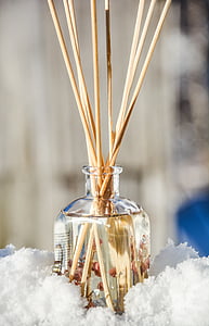 incense sticks on clear glass container thumbnail