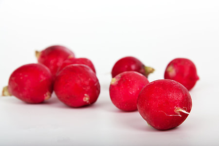 round red fruits on white surface thumbnail