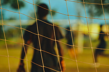 man behind goal during daytime thumbnail