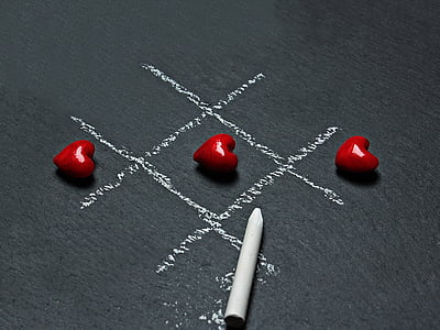 three heart-shape red ornaments thumbnail