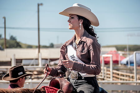 woman on horse wearing sash thumbnail