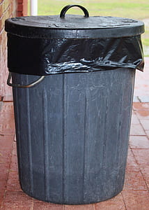 closed trash bin with lid on floor thumbnail