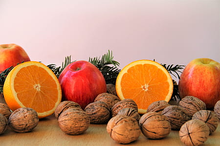 brown nut, lemon fruits, and red apples thumbnail