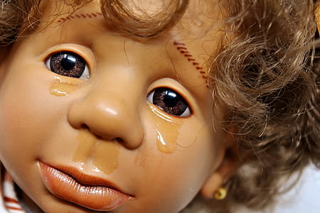 close up photo of doll thumbnail