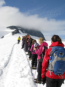 People Climbing a Mountain in the Snow thumbnail