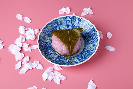 pink rice cake on blue bowl thumbnail