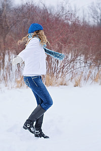 woman in blue jeans and white jacket thumbnail