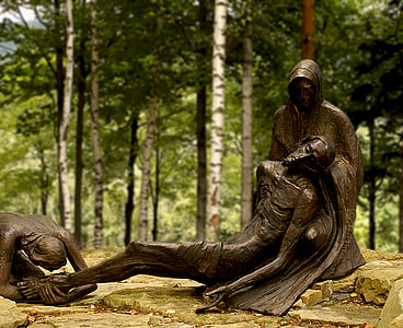 man carrying another man statue thumbnail