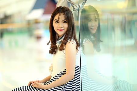 woman leaning glass wall thumbnail