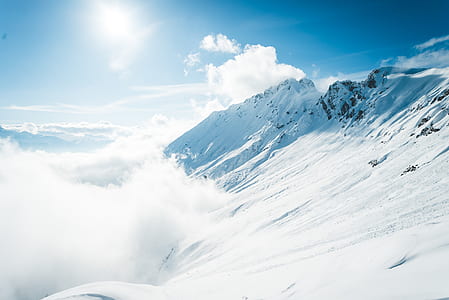 mountain covered by snow at daytime thumbnail