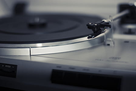 selective focused photo of a vinyl player thumbnail