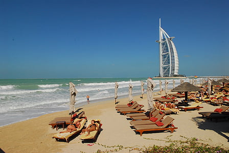 people on beach near Burj Al-Arab thumbnail