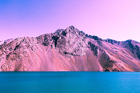 body of water with mountain background thumbnail