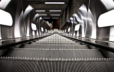 empty escalator under gray shed thumbnail