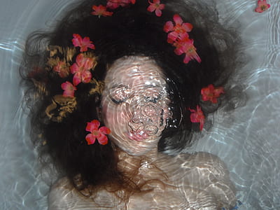 woman in body of water photo thumbnail