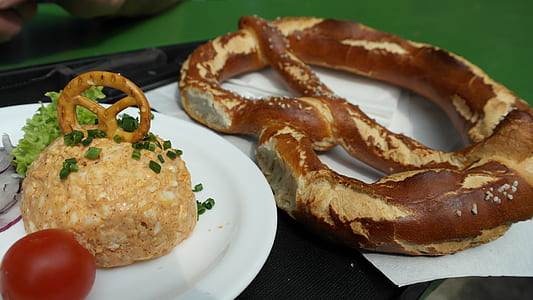 pretzel bread beside plate of rice thumbnail