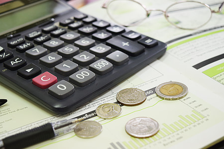 desk calculator on table thumbnail
