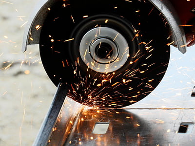 grinder on gray steel rod shallow focus photography thumbnail