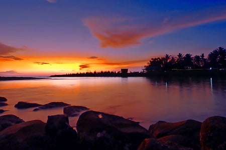 body of water at sunset thumbnail