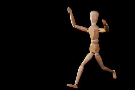 brown wooden action figure thumbnail