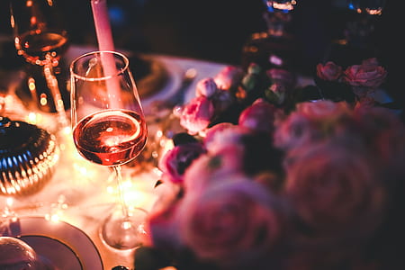 clear wine glass with liquid inside thumbnail
