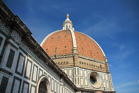 brown and white dome building at daytime thumbnail