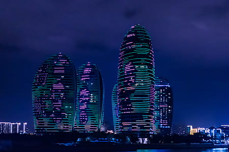 city buildings during nighttime thumbnail