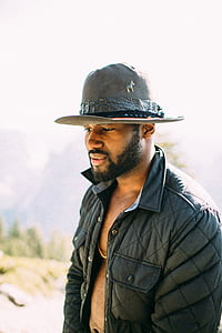 man wearing black leather jacket posing thumbnail