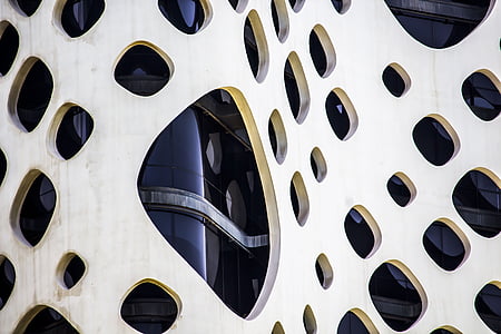 photo of white and black mesh building thumbnail