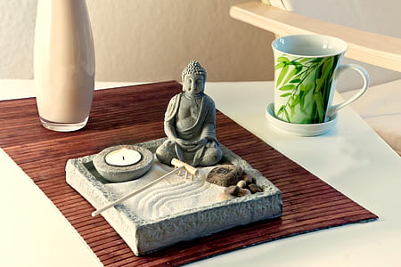 Buddha ceramic figurine on tray thumbnail