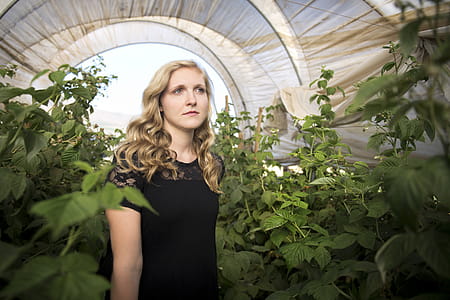 Woman at the Back of Green Plants thumbnail