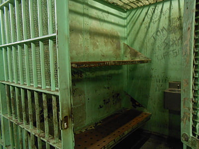green prison cell opened thumbnail