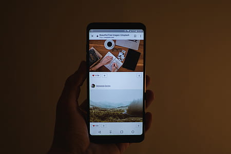 person holding black Android smartphone thumbnail
