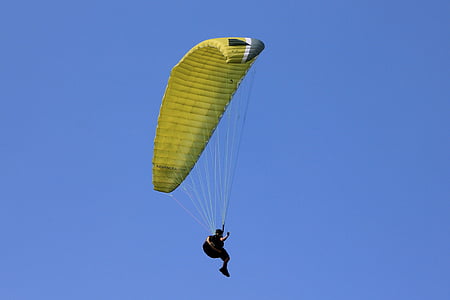 person doing parachute during daytime thumbnail