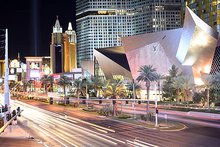landscape photography of city building at night thumbnail