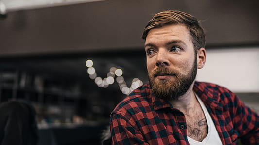 man wearing red and black plaid sport shirt thumbnail