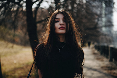 woman wearing black turtle neck shirt in shallow focus photography thumbnail