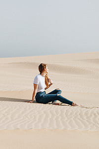 woman sitting on the desert thumbnail