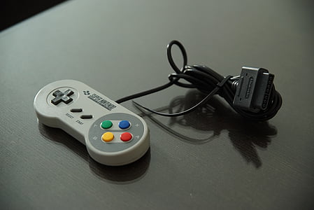 SNES controller on gray pad thumbnail