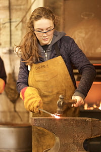 woman hitting metal with hammer thumbnail