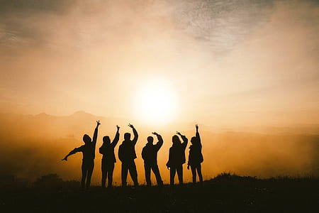 silhouette of people on mountaiin thumbnail