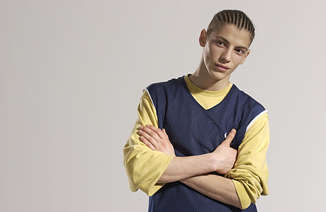 man wearing yellow long-sleeved shirt thumbnail