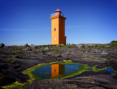 orange tower on gray rock thumbnail