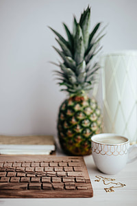 Wooden keyboard and cup of coffee thumbnail
