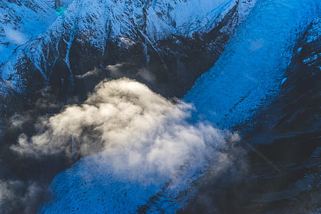 mountain and clouds during nighttime thumbnail