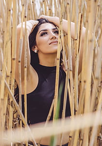 woman holding her hair in bamboo sticks thumbnail