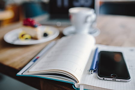 Working in a restaurant: Macbook, Cheese Cake and Cup of Coffee thumbnail